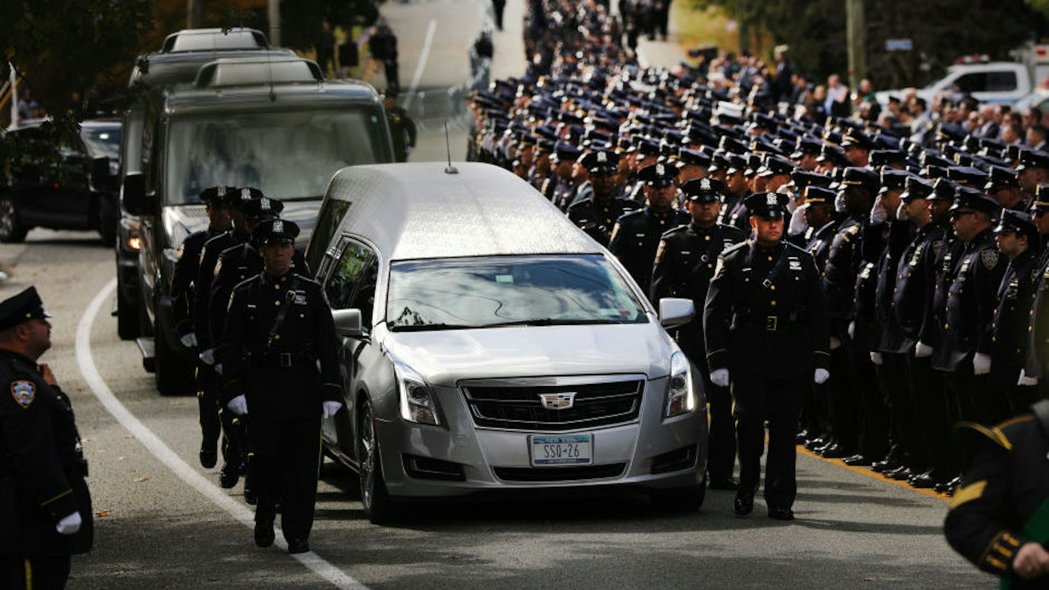 MONROE, NEW YORK - OCTOBER 04: The funeral procession of fallen NYPD Officer Brian Mulkeen departs the Church of the Sacred Heart on October 04, 2019 in Monroe, New York. Officer Mulkeen had been on the force for seven years and was killed while wrestling with an armed man during a confrontation in the Bronx. The shooting has been called a friendly fire incident.