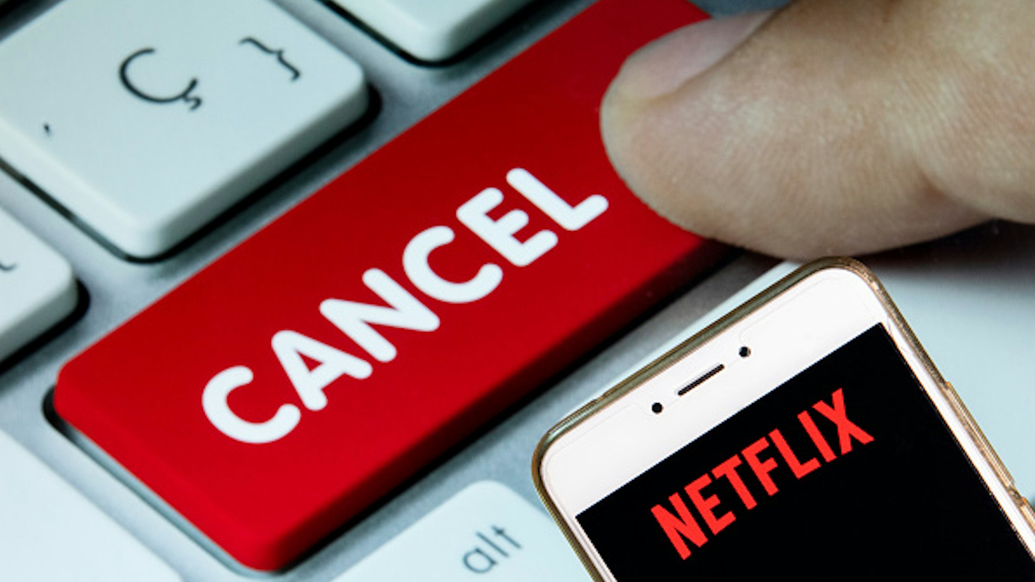 HONG KONG - 2018/12/02: In this photo illustration, the American global on-demand Internet streaming media provider Netflix logo is seen displayed on an Android mobile device with a computer key which says cancel.
