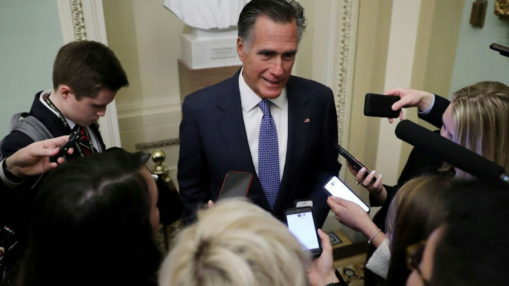 WASHINGTON, DC - JANUARY 21: Sen. Mitt Romney (R-UT) talks to reporters before heading into the weekly Senate Republican policy luncheon at the U.S. Capitol January 21, 2020 in Washington, DC. Senators will vote Tuesday on the rules for President Donald Trump's impeachment trial, which is expected to last three to five weeks.