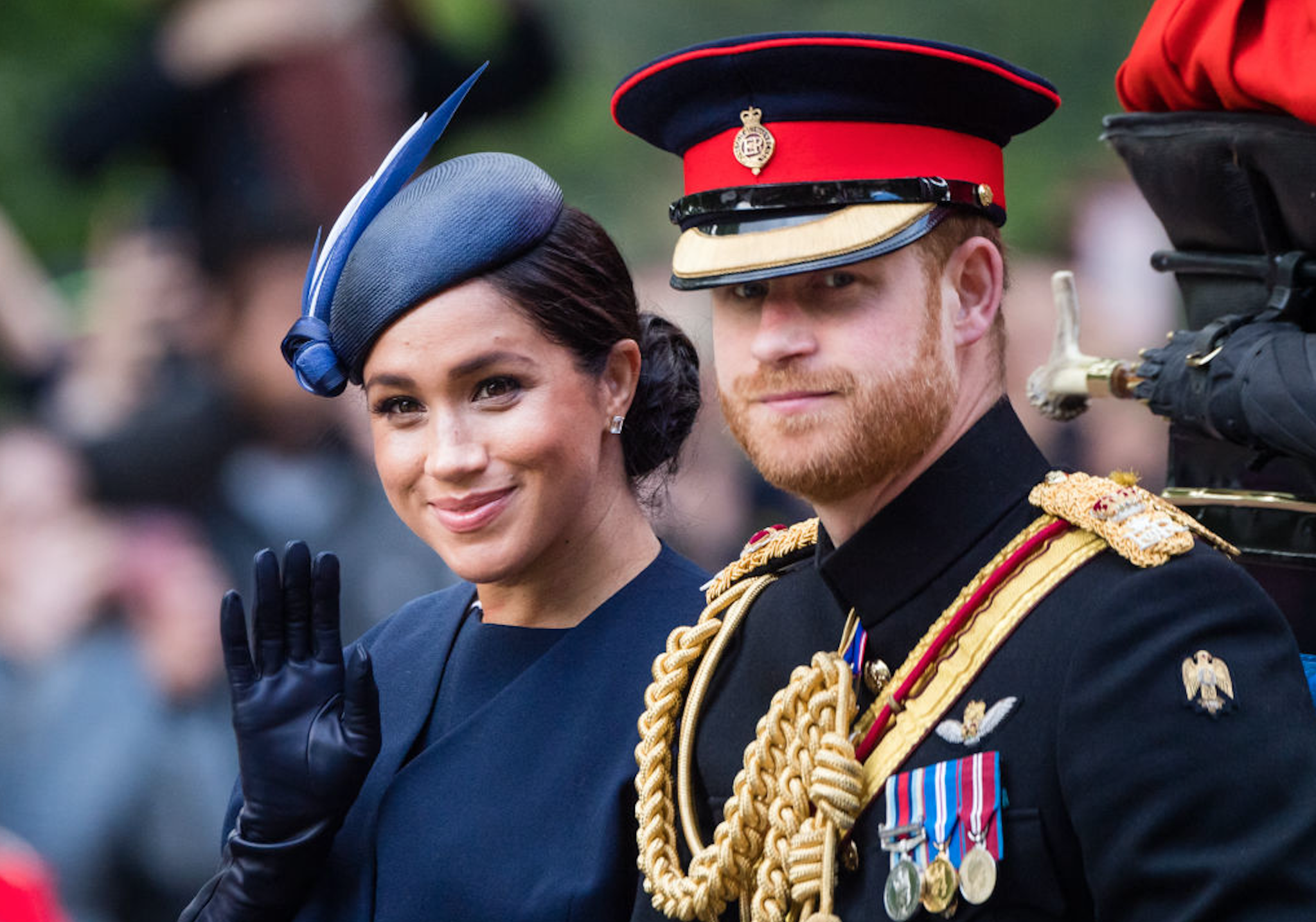 Prince Harry, Duke of Sussex and Meghan, Duchess of Sussex ride by carriage down the Mall during Trooping The Colour, the Queen's annual birthday parade, on June 08, 2019 in London, England.