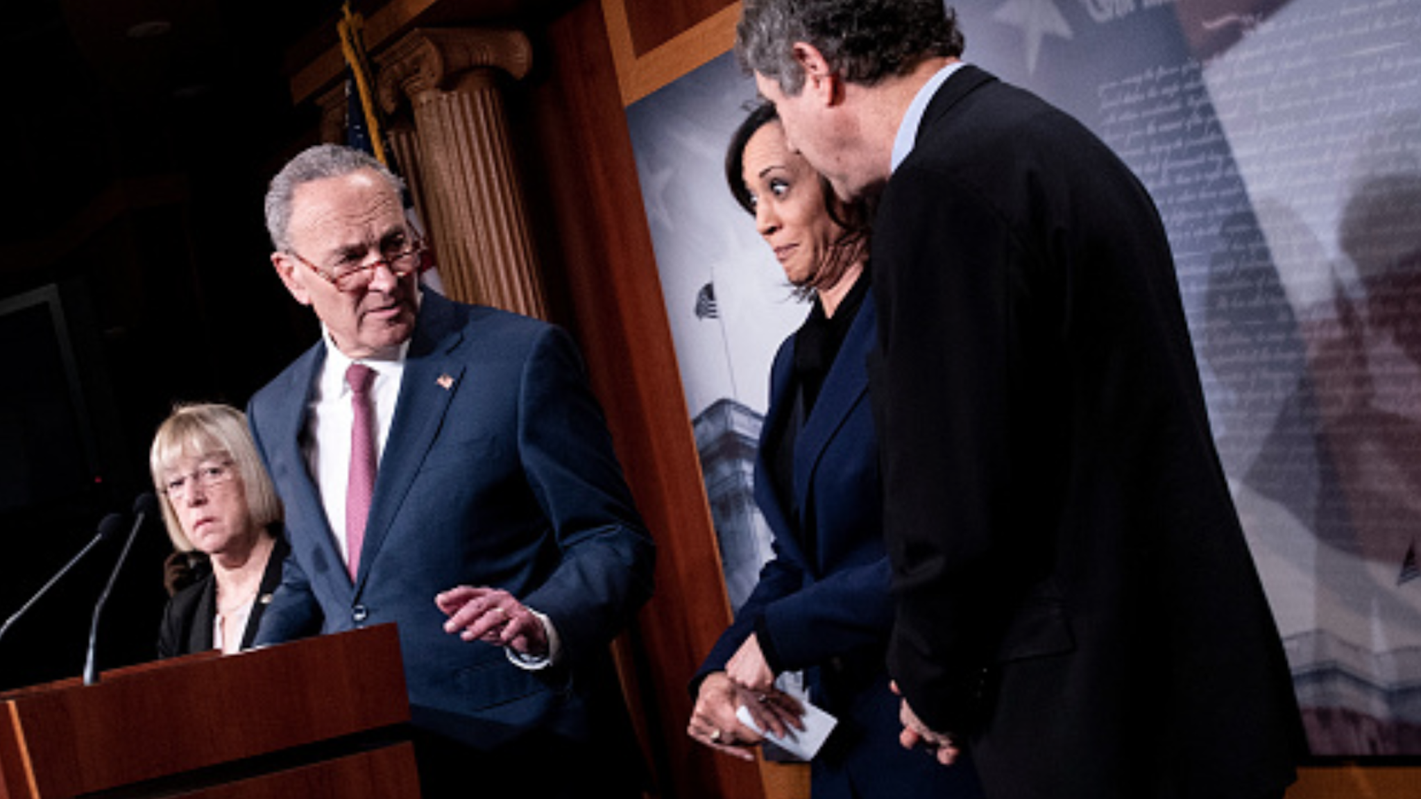 Senator Patty Murray (D-WA) listens while Senate Minority Leader Charles E. Schumer (D-NY) shushes Senator Kamala Harris (D-CA) and Senator Sherrod Brown (D-OH) during a press conference during the impeachment trial of US President Donald Trump on Capitol Hill January 31, 2020, in Washington, DC. - The US Senate could acquit Donald Trump of impeachment charges as early as January 31, 2020 after Democratic efforts to call trial witnesses appeared to fall short, handing the president a decisive political victory heading into a tough re-election fight.