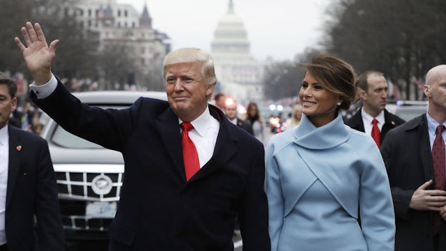 U.S. President Donald Trump waves while walking with U.S. First Lady Melania Trump during a parade following the 58th presidential inauguration in Washington, D.C., U.S., on Friday, Jan. 20, 2017. Monday, January 20, 2020, marks the third anniversary of U.S. President Donald Trump's inauguration. Our editors select the best archive images looking back over Trump’s term in office. Photographer: Evan Vucci/Pool via Bloomberg