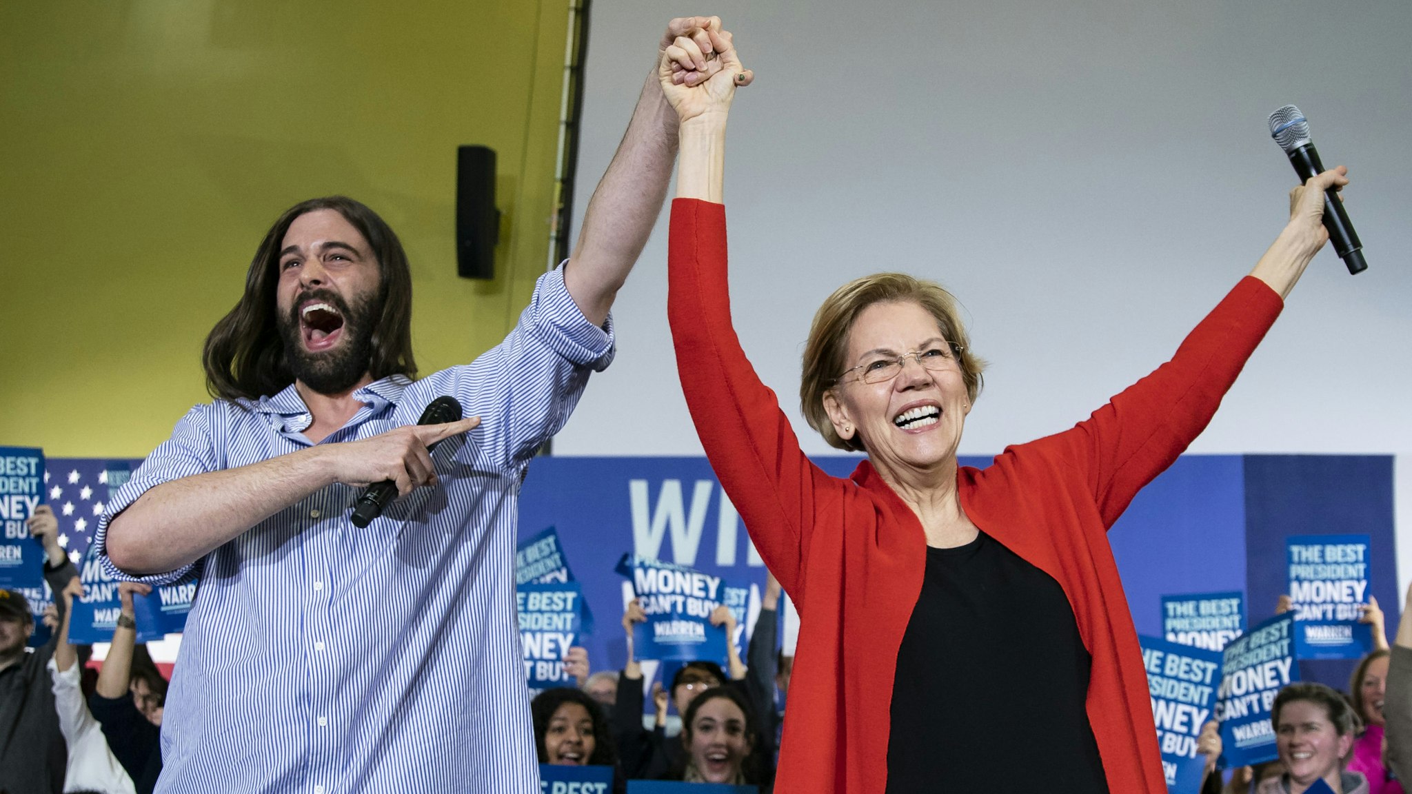 Senator Elizabeth Warren, a Democrat from Massachusetts and 2020 presidential candidate, right, arrives with Jonathan Van Ness, a celebrity hairdresser, during a campaign event in Cedar Rapids, Iowa, U.S., on Sunday, Jan. 26, 2020. The Des Moines Register endorsed progressive favorite Warren a little more than a week before the Iowa caucuses on Feb. 3, saying the Massachusetts lawmaker would "push an unequal America in the right direction."