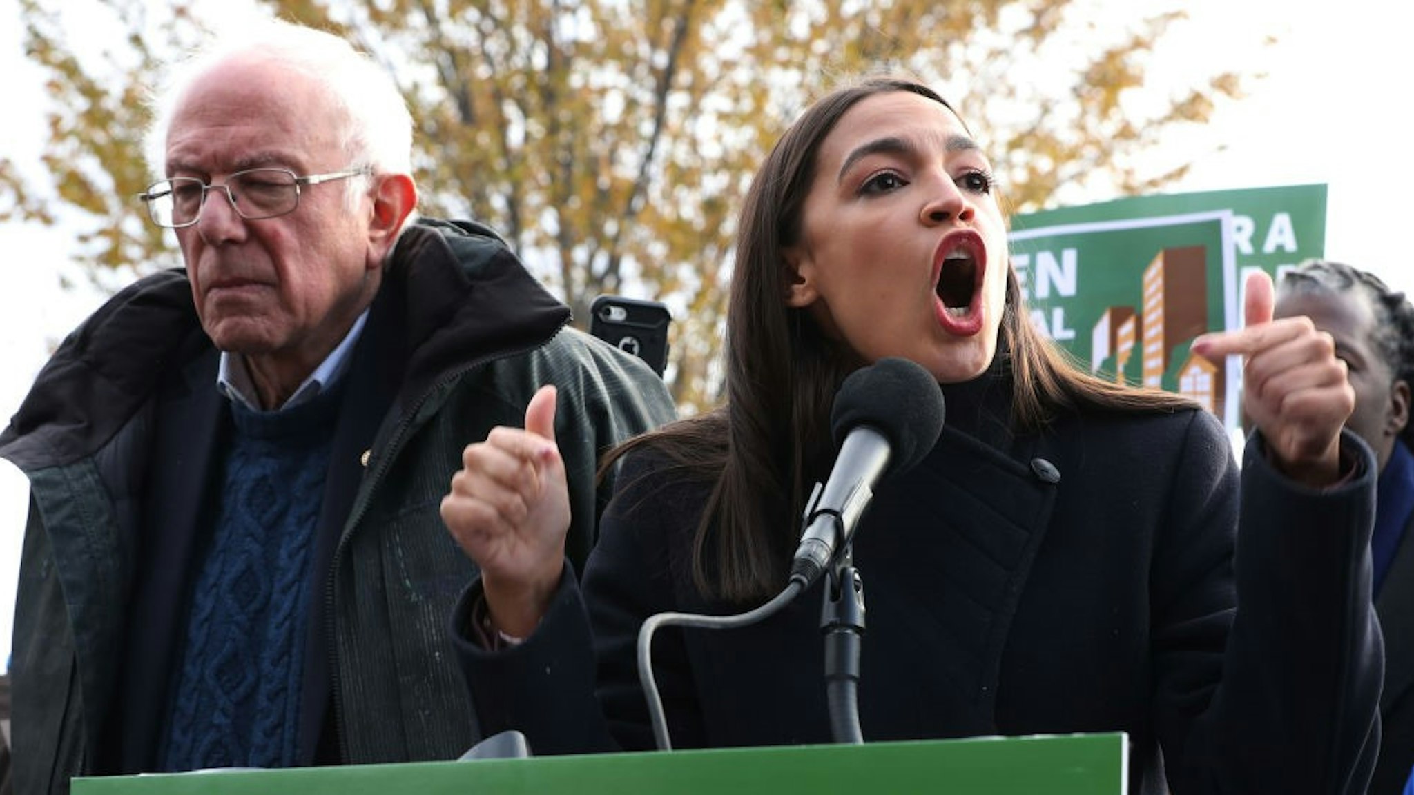 Democratic presidential candidate Sen. Bernie Sanders (I-VT) (L) and Rep. Alexandria Ocasio-Cortez (D-NY) hold a news conference to introduce legislation to transform public housing as part of their Green New Deal proposal outside the U.S. Capitol November 14, 2019 in Washington, DC.