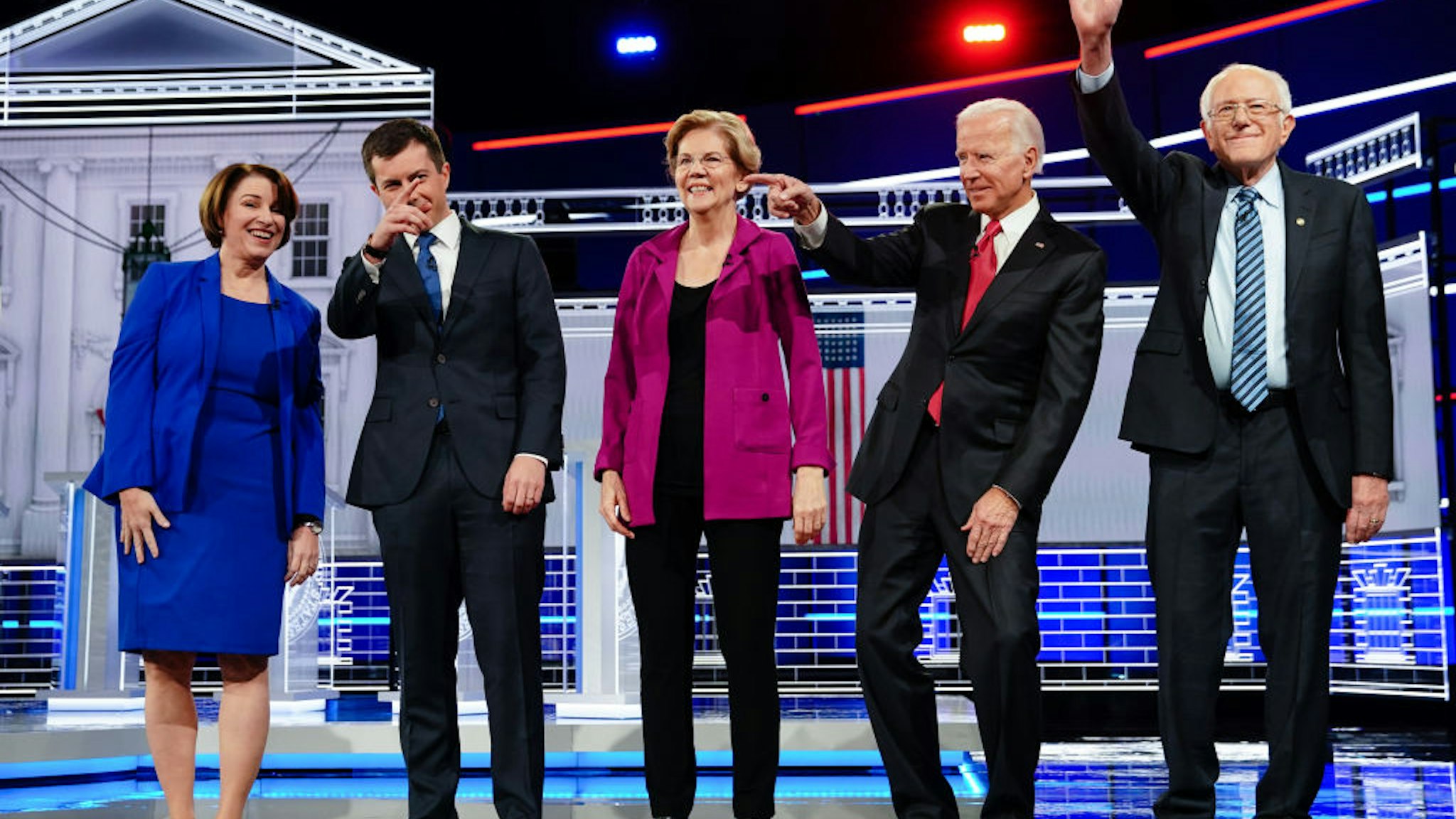 2020 presidential candidates Senator Amy Klobuchar, a Democrat from Minnesota, from left, Pete Buttigieg, mayor of South Bend, Senator Elizabeth Warren, a Democrat from Massachusetts, Former U.S. Vice President Joe Biden, and Senator Bernie Sanders, an independent from Vermont, stand on stage for the Democratic presidential debate in Atlanta, Georgia, U.S., on Wednesday, Nov. 20, 2019. The Democratic presidential races new pecking order will be on full display Wednesday night, with Pete Buttigieg taking the debate stage as the emerging front-runner in Iowa and top 2020 rivals Joe Biden and Senator Elizabeth Warren trying to knock him off that perch.