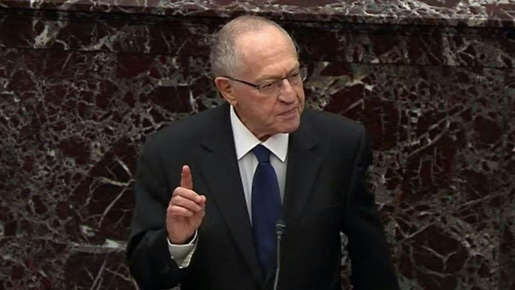 WASHINGTON, DC - JANUARY 27: In this screenshot taken from a Senate Television webcast, Legal Counsel for President Donald Trump, Alan Dershowitz speaks during impeachment proceedings against U.S. President Donald Trump in the Senate at the U.S. Capitol on January 27, 2020 in Washington, DC. Democratic House managers have concluded their opening arguments and President Trump's lawyers now continue to present their defense. (Photo by