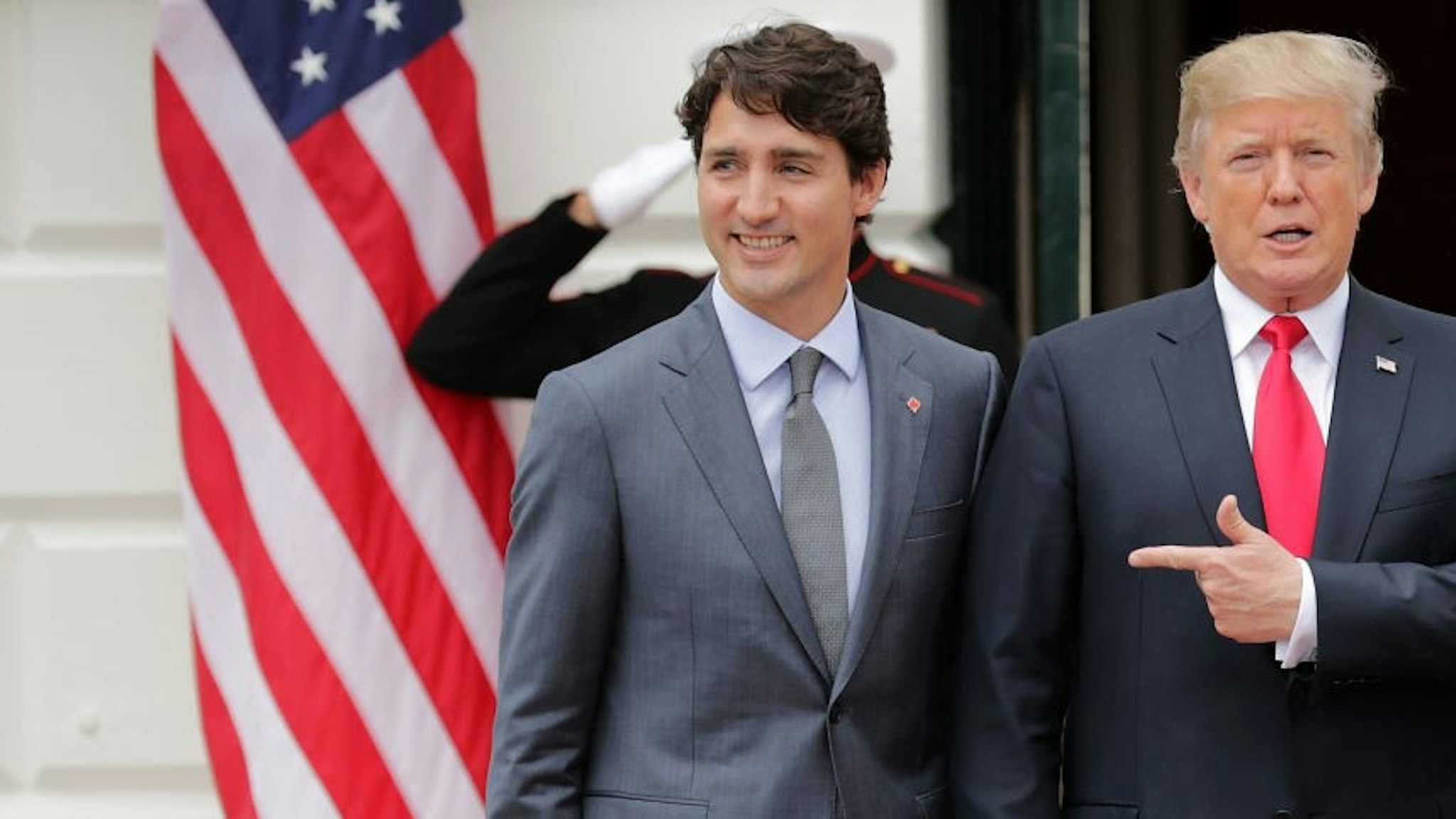 Canadian Prime Minister Justin Trudeau (L) and U.S. President Donald Trump pose for photographs at the White House October 11, 2017 in Washington, DC. The United States, Canada and Mexico are currently engaged in renegotiating the 25-year-old North American Free Trade Agreement