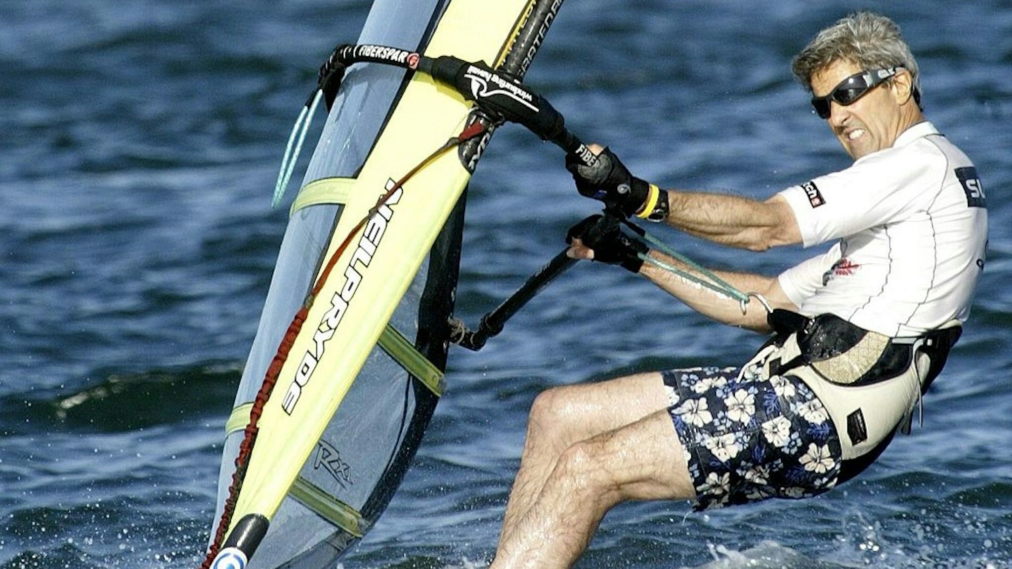 Democratic presidential candidate John Kerry windsurfs on the coast of Nantucket, Massachusetts during a brake of his campaign 30 August 2004. US President George W. Bush has gained ground against Democratic challenger Kerry in two key states that former vice president Al Gore captured in the 2000 presidential election, an opinion poll showed Monday. Among likely voters, Bush holds a 48 to 45 percent lead over Kerry in Wisconsin, won by Gore in 2000, according to the USA Today/CNN/Gallup Poll.