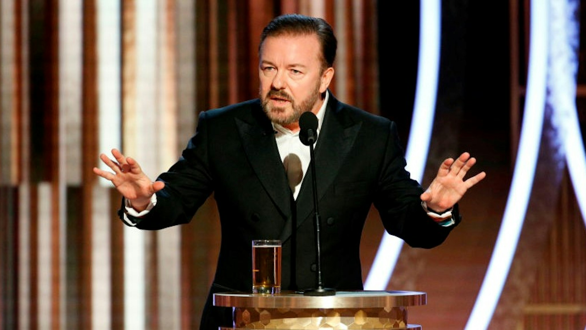 host Ricky Gervais speaks onstage during the 77th Annual Golden Globe Awards at The Beverly Hilton Hotel on January 5, 2020 in Beverly Hills, California.