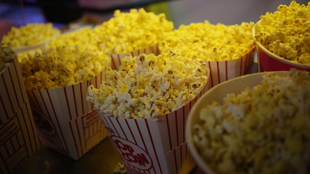 Freshly popped popcorn is displayed for sale inside the snack bar at the Georgetown Drive-In movie theater in Georgetown, Indiana, U.S., on Friday, July 17, 2015.