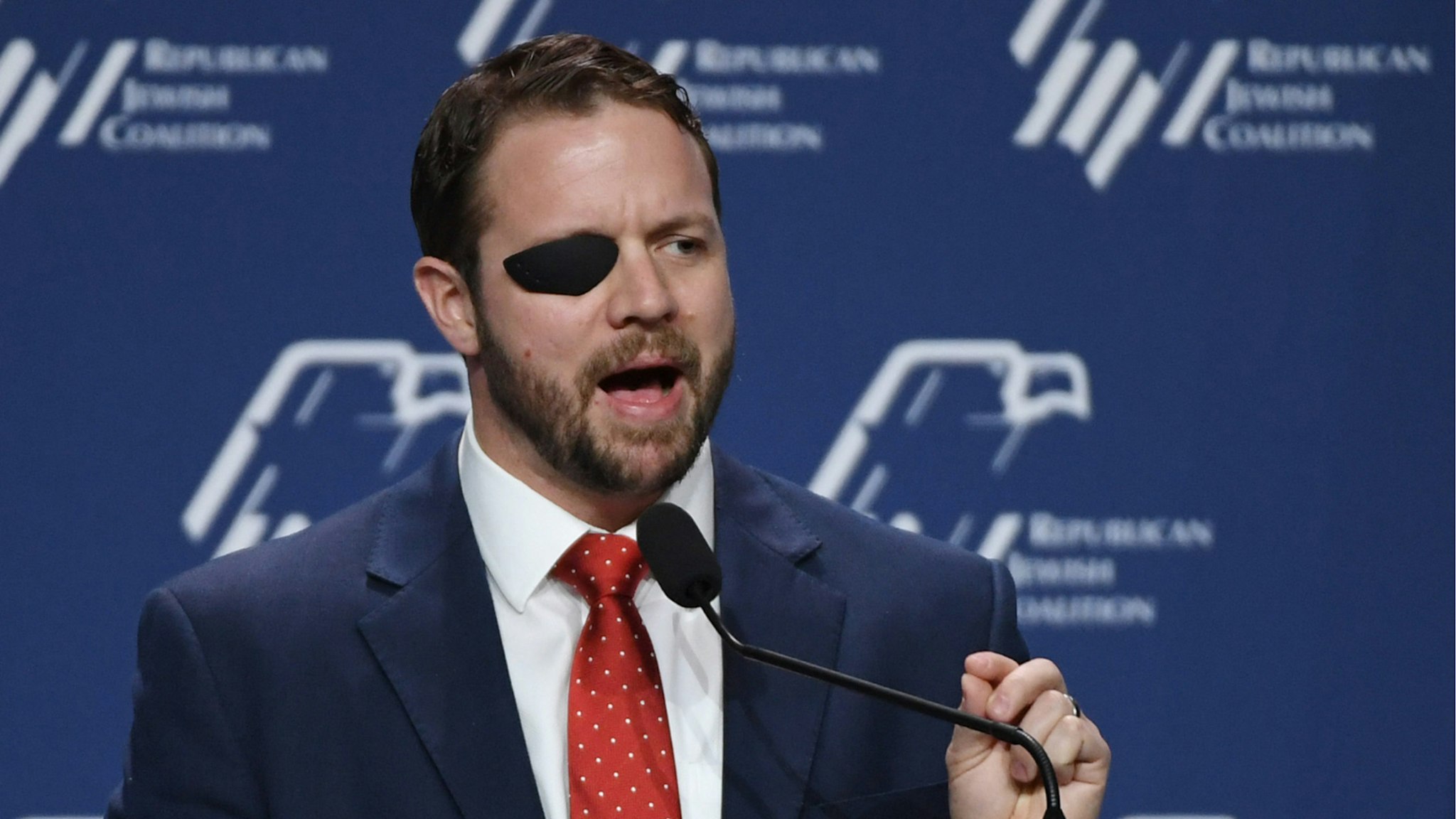 U.S. Rep. Dan Crenshaw (R-TX) speaks at the Republican Jewish Coalition's annual leadership meeting at The Venetian Las Vegas after appearances by U.S. President Donald Trump and Vice President Mike Pence on April 6, 2019 in Las Vegas, Nevada.