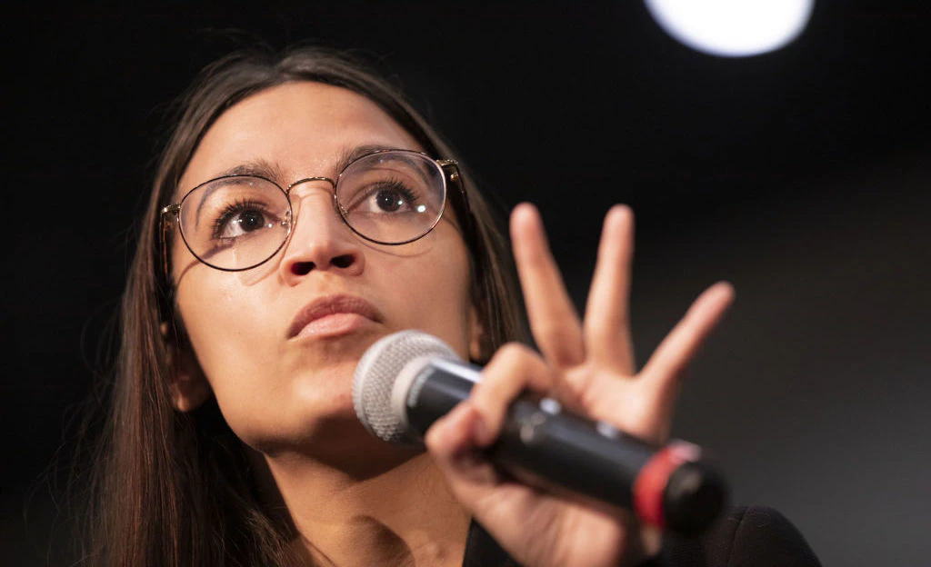 U.S. Representative Alexandria Ocasio-Cortez, a democrat from New York, speaks during a campaign rally for Senator Bernie Sanders, an independent from Vermont and 2020 presidential candidate, not pictured, in Sioux City, Iowa, U.S., on Sunday, Jan. 26, 2020. New polls showed the unsettled state of the Democratic primary days before the first voters weigh in at the Iowa caucuses, with front-runner status still unclear. Photographer: Daniel Acker/Bloomberg