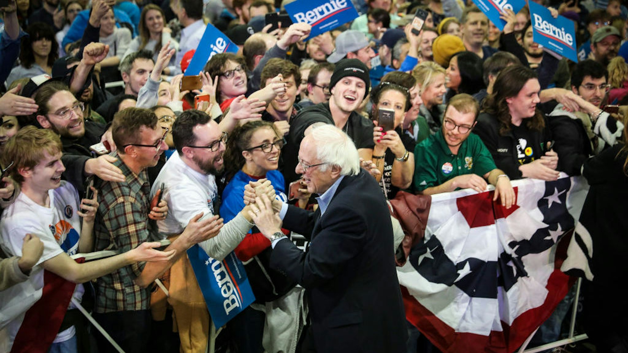 Democratic presidential candidate Sen. Bernie Sanders (I-VT) greets the crowd after speaking to a large group of supporters at a rally in the Colorado Convention Center on February 16, 2020 in Denver, Colorado. (Photo by Marc Piscotty/Getty Images)