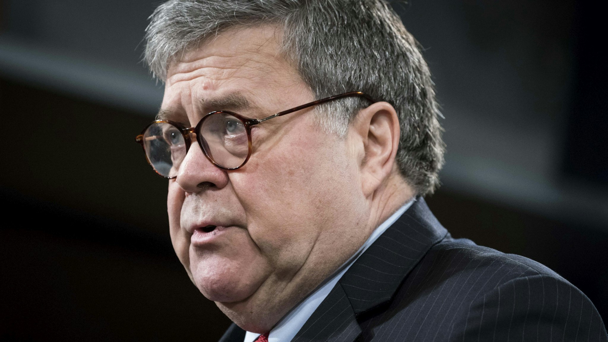 WASHINGTON, DC - FEBRUARY 10: Attorney General William Barr participates in a press conference at the Department of Justice on February 10, 2020 in Washington, DC. Barr announced the indictment of four members of China's military on charges of hacking into Equifax Inc. and stealing data from millions of Americans.