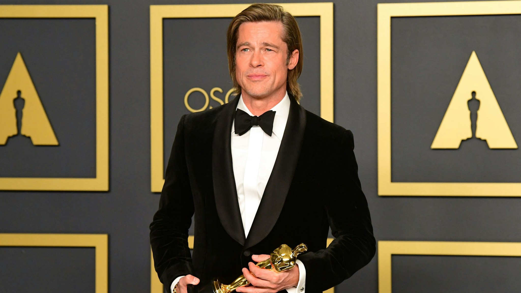 US actor Brad Pitt poses in the press room with the Oscar for Best Supporting Actor during the 92nd Oscars at the Dolby Theater in Hollywood, California on February 9, 2020.