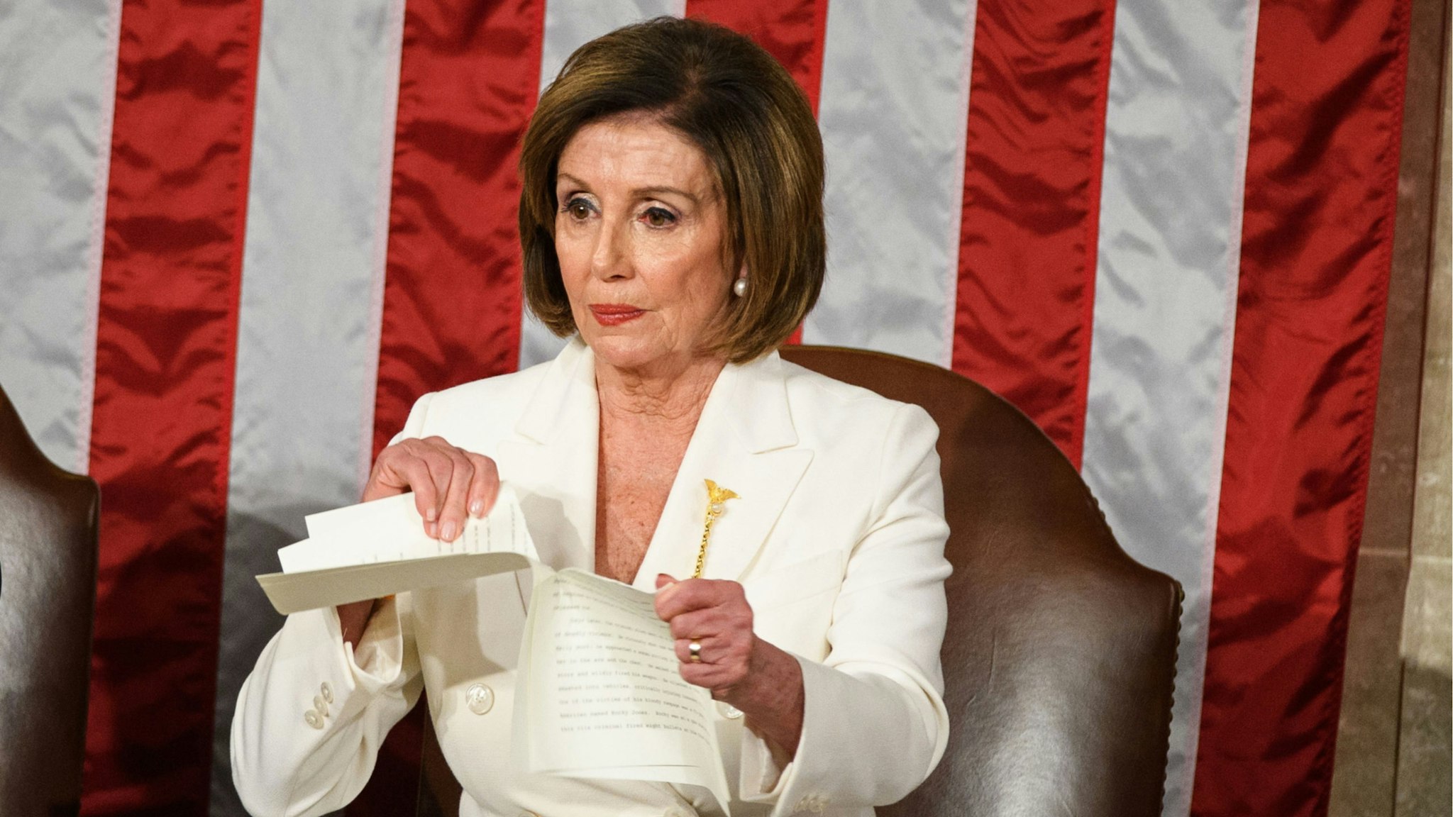 Speaker of the US House of Representatives Nancy Pelosi rips a copy of US President Donald Trumps speech after he delivers the State of the Union address at the US Capitol in Washington, DC, on February 4, 2020.