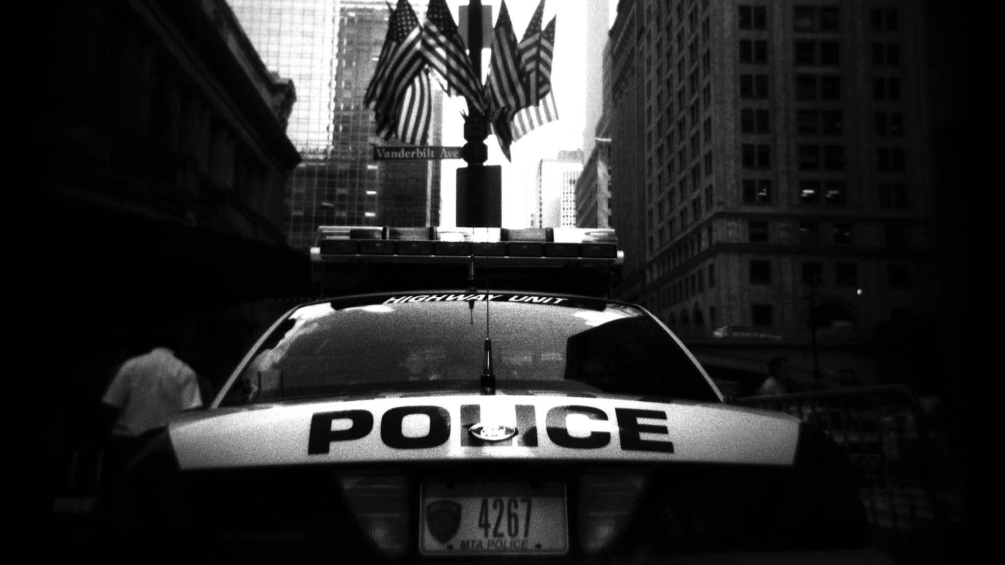 A New York City police car blocks traffic from entering Vanderbilt street in front of Grand Central station August 4, 2004 in New York City.