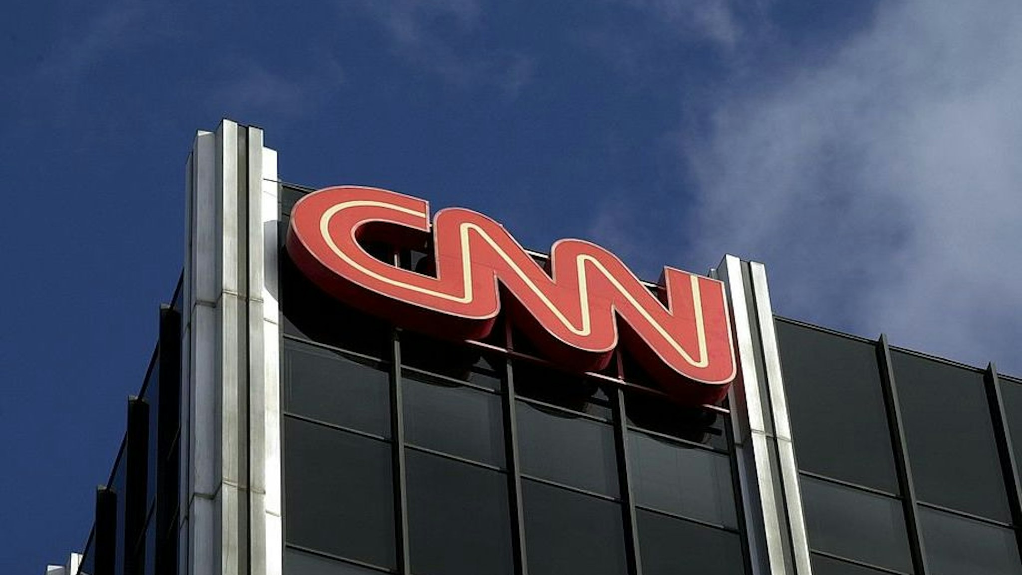 The Cable News Network (CNN) logo adorns the top of CNN's offices on the Sunset Strip, January 24, 2000 in Hollywood, CA. CNN was hit with job cuts earlier this week after CNN's parent company, Time-Warner, Inc., completed its merger with America Online, Inc.