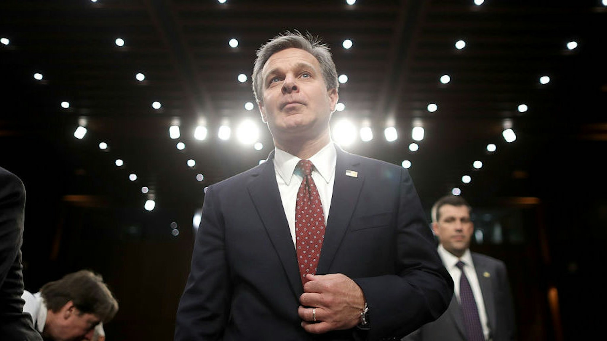 Federal Bureau of Investigation Director Christopher Wray arrives to testify before the Judiciary Committee in the Hart Senate Office Building on Capitol Hill June 18, 2018 in Washington, DC. According to a report by Justice Department Inspector General Michael Horowitz, former FBI Director James Comey and other top officials did not follow standard procedures in their handling of the 2016 investigation into Hillary Clinton's email server, but did not find any evidence of political bias. (Photo by Chip Somodevilla/Getty Images)