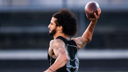 Colin Kaepernick Colin Kaepernick looks to pass during his NFL workout held at Charles R Drew high school on November 16, 2019 in Riverdale, Georgia. (Photo by Carmen Mandato/Getty Images)