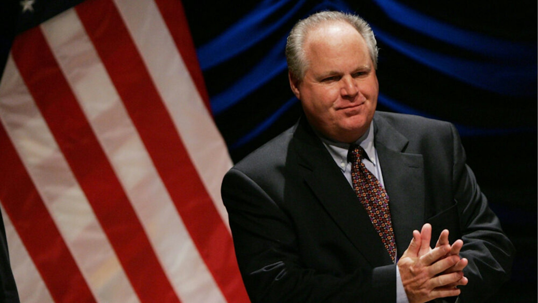 Radio personality Rush Limbaugh interacts with the audience before the start of a panel discussion "'24' and America's Image in Fighting Terrorism: Fact, Fiction, or Does It Matter?", June 23, 2006 in Washington, DC.