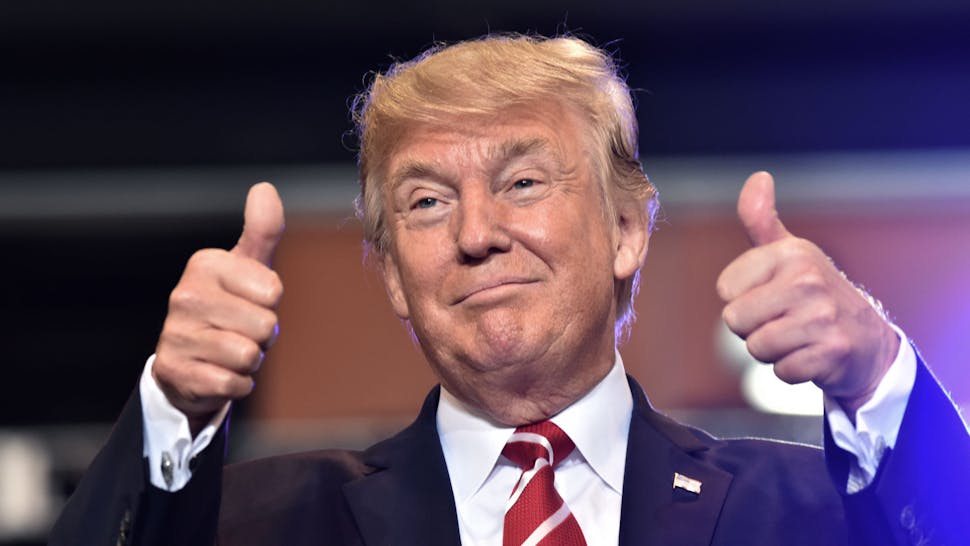 Trump US President Donald Trump speaks at a "Make America Great Again" rally in Phoenix, Arizona, on August 22, 2017.