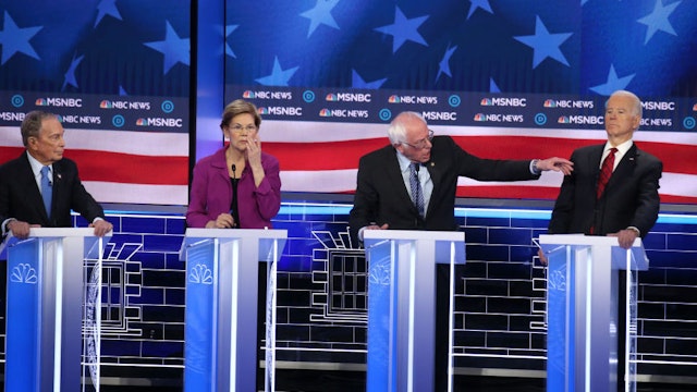 LAS VEGAS, NEVADA - FEBRUARY 19: Democratic presidential candidate Sen. Bernie Sanders (I-VT) (R) makes a point as Sen. Elizabeth Warren (D-MA), former New York City mayor Mike Bloomberg(L) and former Vice President Joe Biden (R) listen during the Democratic presidential primary debate at Paris Las Vegas on February 19, 2020 in Las Vegas, Nevada. Six candidates qualified for the third Democratic presidential primary debate of 2020, which comes just days before the Nevada caucuses on February 22.