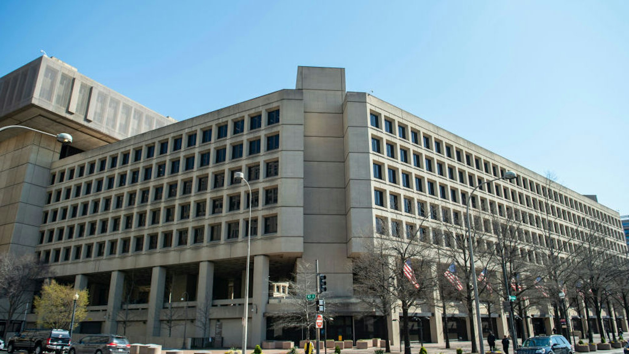 The J. Edgar Hoover Building of the Federal Bureau of Investigation (FBI) is seen on April 03, 2019 in Washington, DC. - The FBI is the domestic intelligence and security service of the United States, and its principal federal law enforcement agency. Operating under the jurisdiction of the United States Department of Justice, the FBI is also a member of the U.S. Intelligence Community and reports to both the Attorney General and the Director of National Intelligence. (Photo by Eric BARADAT / AFP)