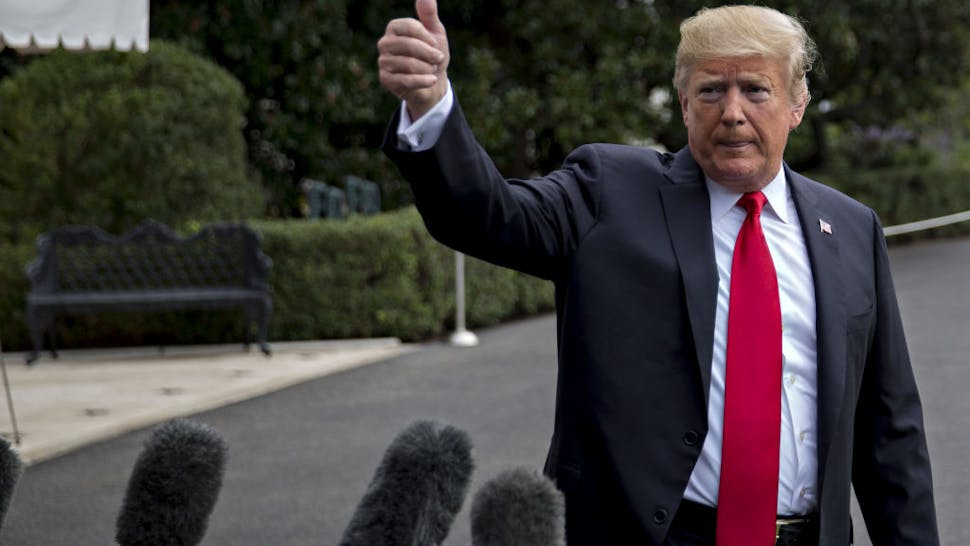 President Trump Departs White House For Florida U.S. President Donald Trump gives a thumbs-up after speaking to members of the media before boarding Marine One on the South Lawn of the White House in Washington, D.C., U.S., on Monday, Oct. 8, 2018.