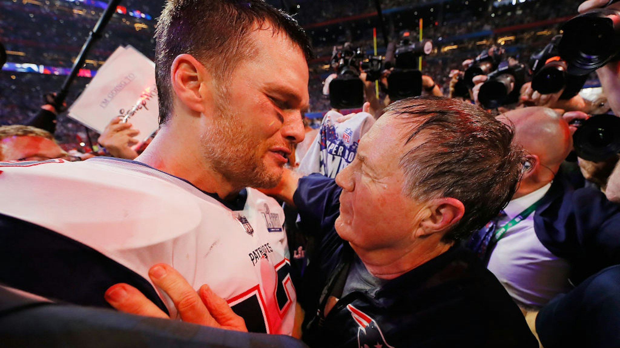 Tom Brady #12 of the New England Patriots talks to head coach Bill Belichick of the New England Patriots after the Patriots defeat the Rams 13-3 during Super Bowl LIII at Mercedes-Benz Stadium on February 3, 2019 in Atlanta, Georgia.