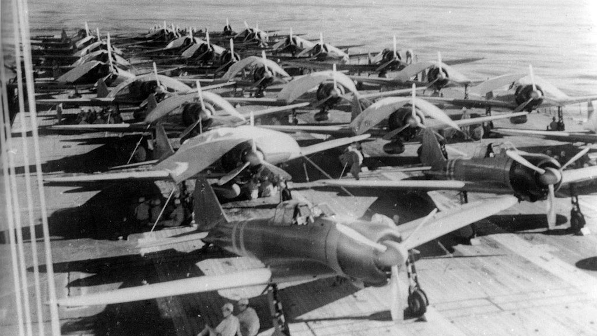 Aircraft are prepared for a morning sortie on the Imperial Japanese Navy aircraft carrier Zuikaku, east of the Solomon Islands, on May 5, 1942.