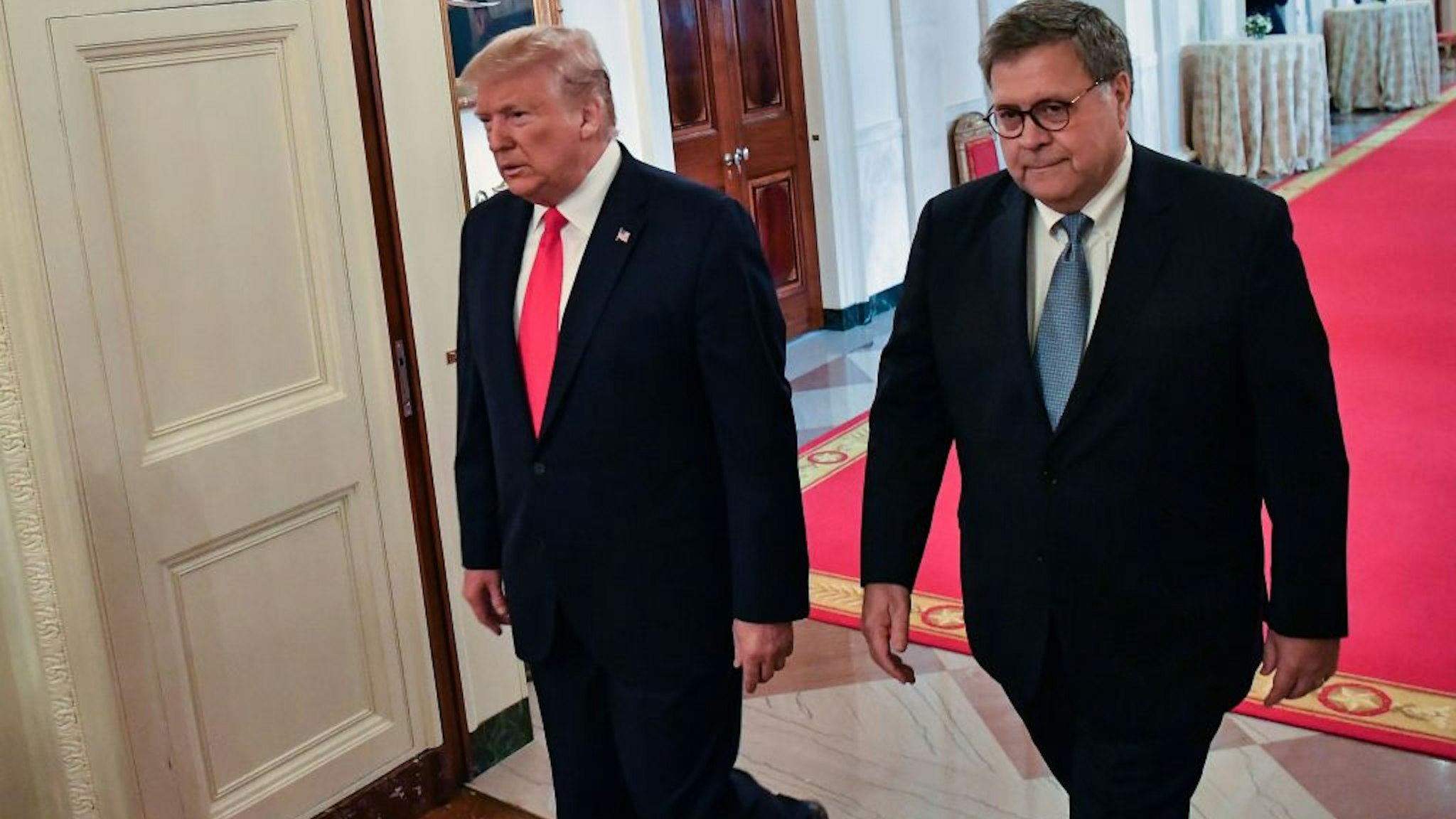 US President Donald Trump (L) and Attorney General William Barr arrive to present the Medal of Valor and Heroic Commendations