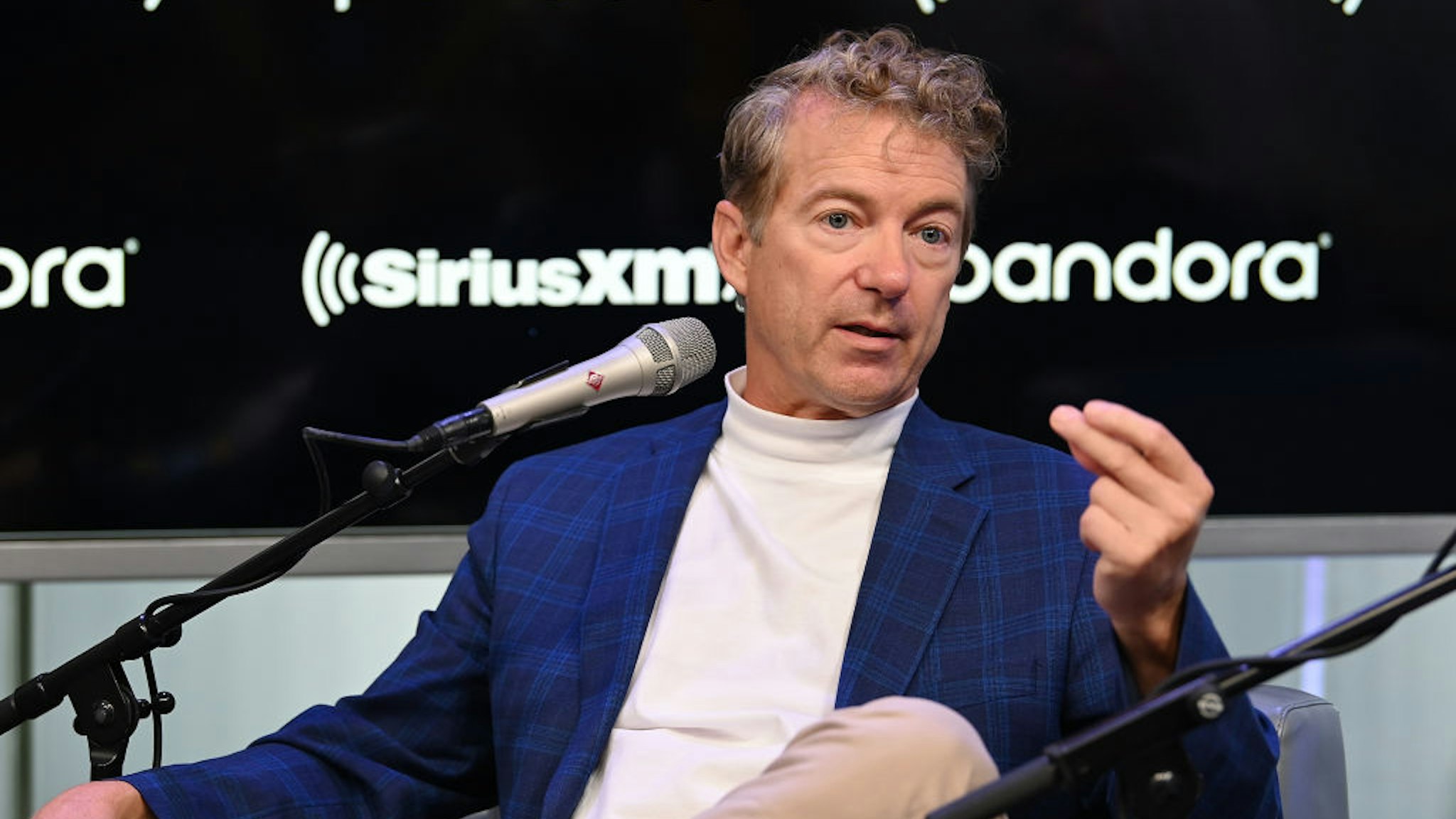 Senator Rand Paul talks with SiriusXM's Olivier Knox and Julie Mason during a Town Hall event on October 11, 2019 in New York City.