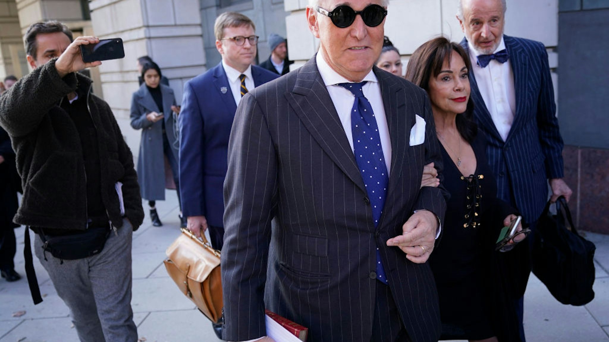 Former advisor to U.S. President Donald Trump, Roger Stone, departs the E. Barrett Prettyman United States Courthouse with his wife Nydia after being found guilty of obstructing a congressional investigation into Russia’s interference in the 2016 election on November 15, 2019 in Washington, DC.