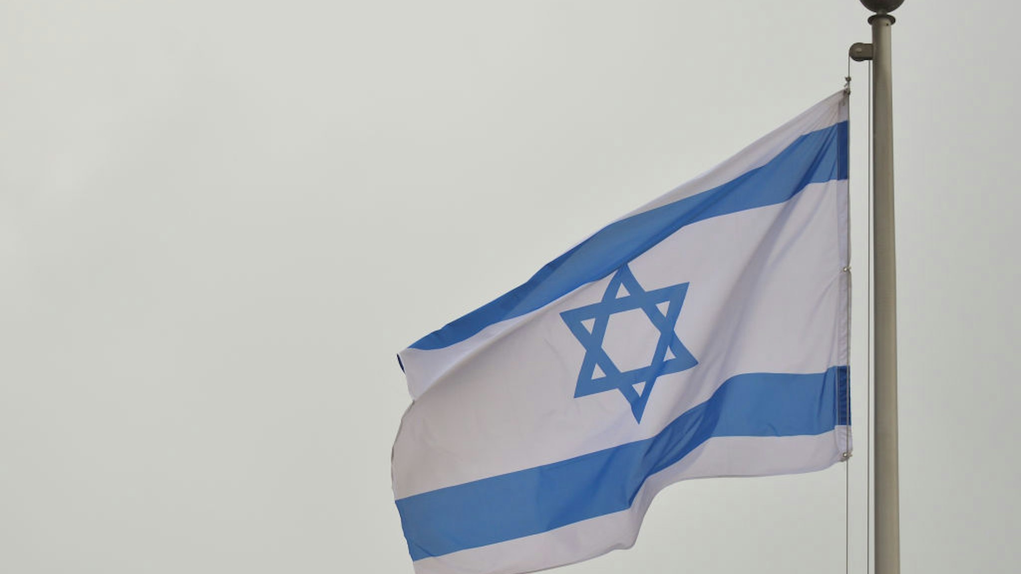 An Israeli national flag seen in the Old Town in Jerusalem. On Tuesday, February 4, 2020, in Jerusalem, Israel.