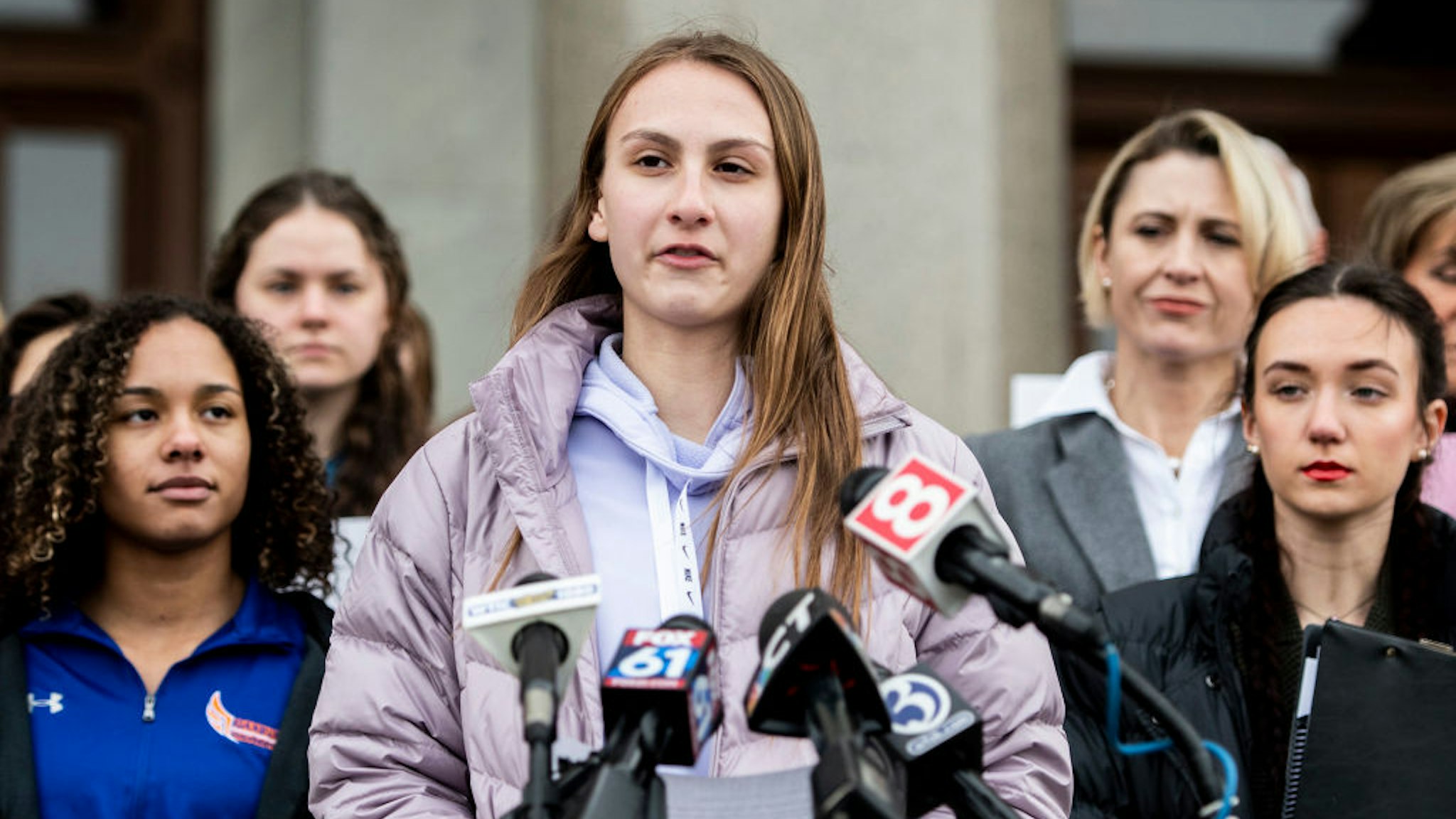 Canton High School senior Chelsea Mitchell speaks during a press conference with Alanna Smith, Danbury High School sophomore, to her left and Selina Soule, Glastonbury High School senior, to her right at the Connecticut State Capitol Wednesday, Feb. 12, 2020, in downtown Hartford, Conn.