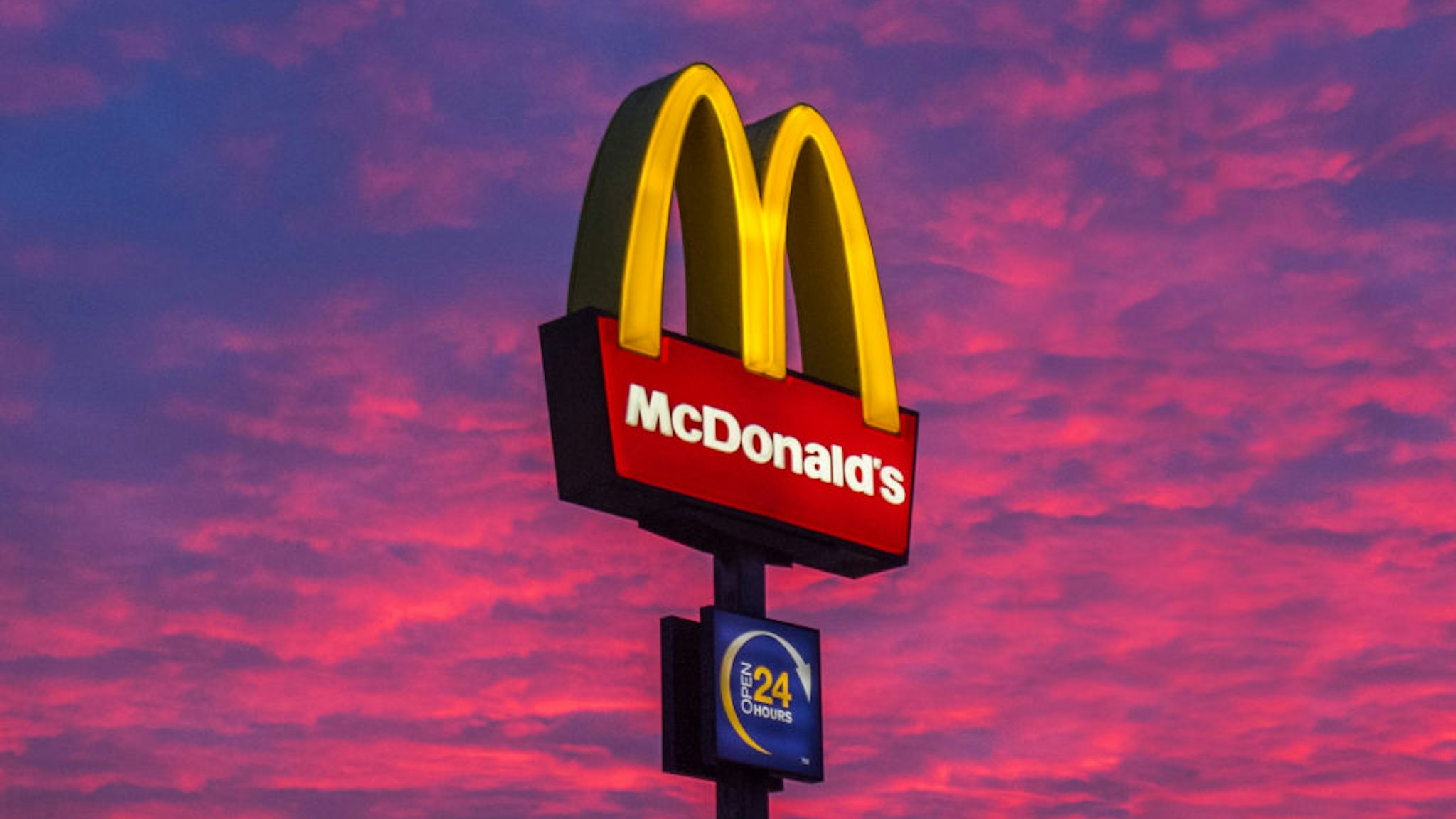 The sky turns red as the sun sets behind a McDonalds restaurant in Southport on January 19, 2020 in SOUTHPORT, Lancashire, UK.