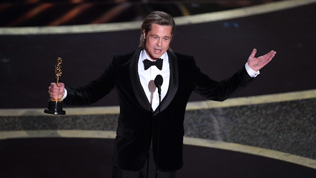HOLLYWOOD, CALIFORNIA - FEBRUARY 09: Brad Pitt accepts the Actor in a Supporting Role award for 'Once Upon a Time...in Hollywood' onstage during the 92nd Annual Academy Awards at Dolby Theatre on February 09, 2020 in Hollywood, California. (Photo by Kevin Winter/Getty Images)