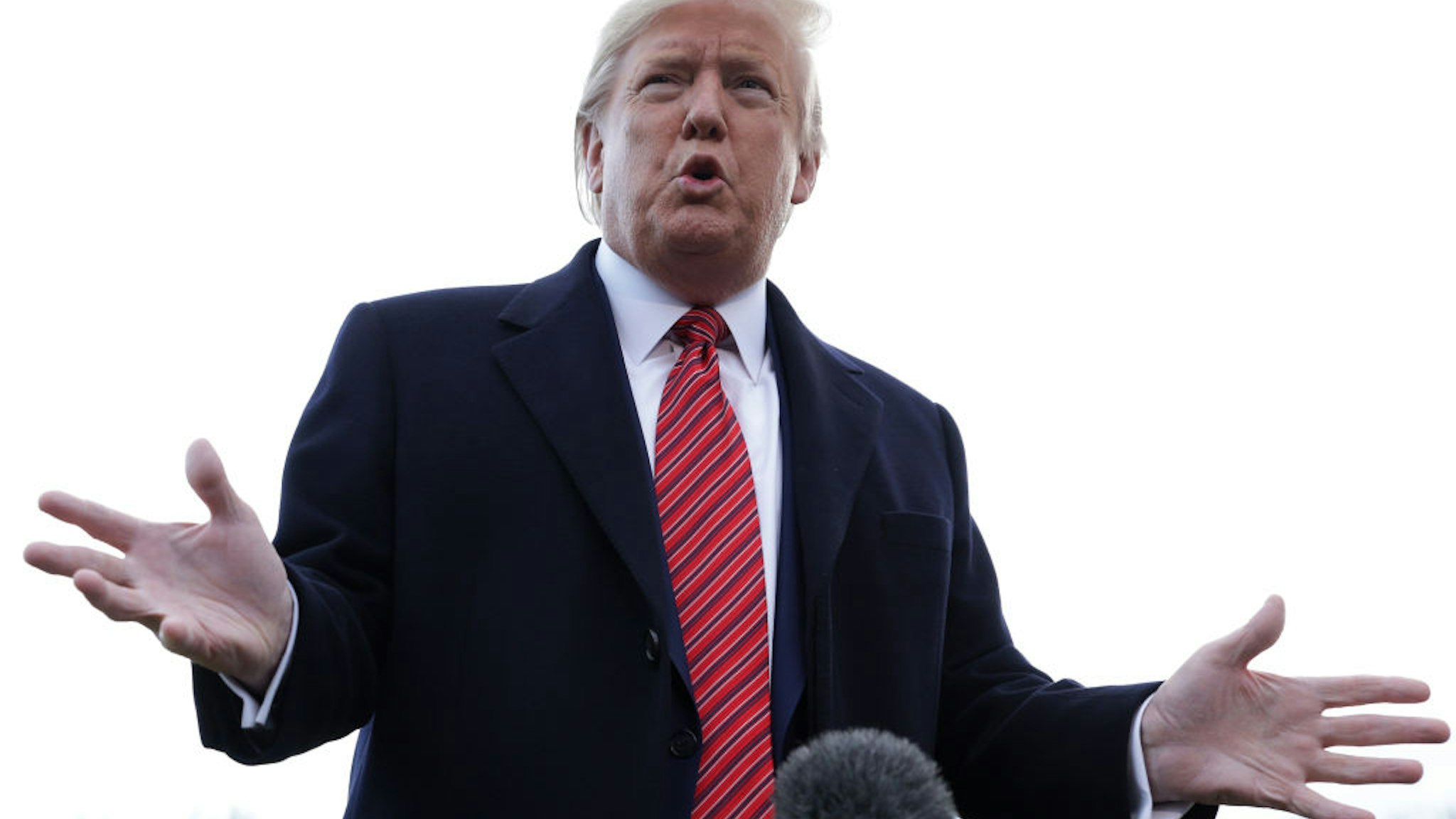 U.S. President Donald Trump speaks to members of the media prior to his departure from the White House February 28, 2020 in Washington, DC.