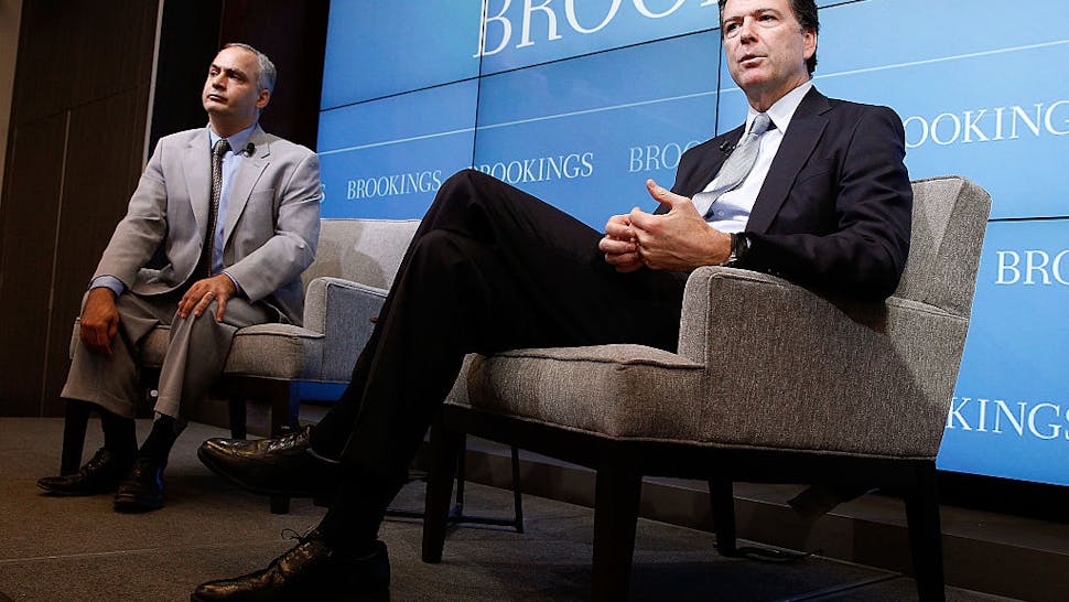 FBI Director James Comey Speaks On Technology, Privacy, And Public Safety At The Brookings Institution FBI Director James Comey (R) discusses the impact of technology on the work of law enforcement in a conversation with Benjamin Wittes, Brookings Senior Fellow in Governance Studies, at the "Going Dark: Are Technology, Privacy, and Public Safety on a Collision Course?" event at the Brookings Institution on October 16, 2014 in Washington, DC.