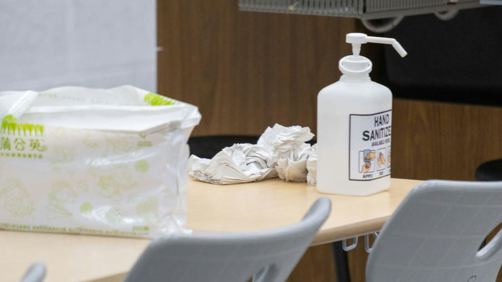 A view of a hand sanitizer and tissues on a desk of the school's chemistry lab. After the decision of the Taiwanese ministry of education to close the schools until February 25, 2020 with the aim of preventing and fighting against the Coronavirus, the American school of Taipei, set up a system of digital learning to enable students to continue their education. TAS is one of the most prestigious private schools in Taiwan. (Photo by Walid Berrazeg/SOPA Images/LightRocket via Getty Images)
