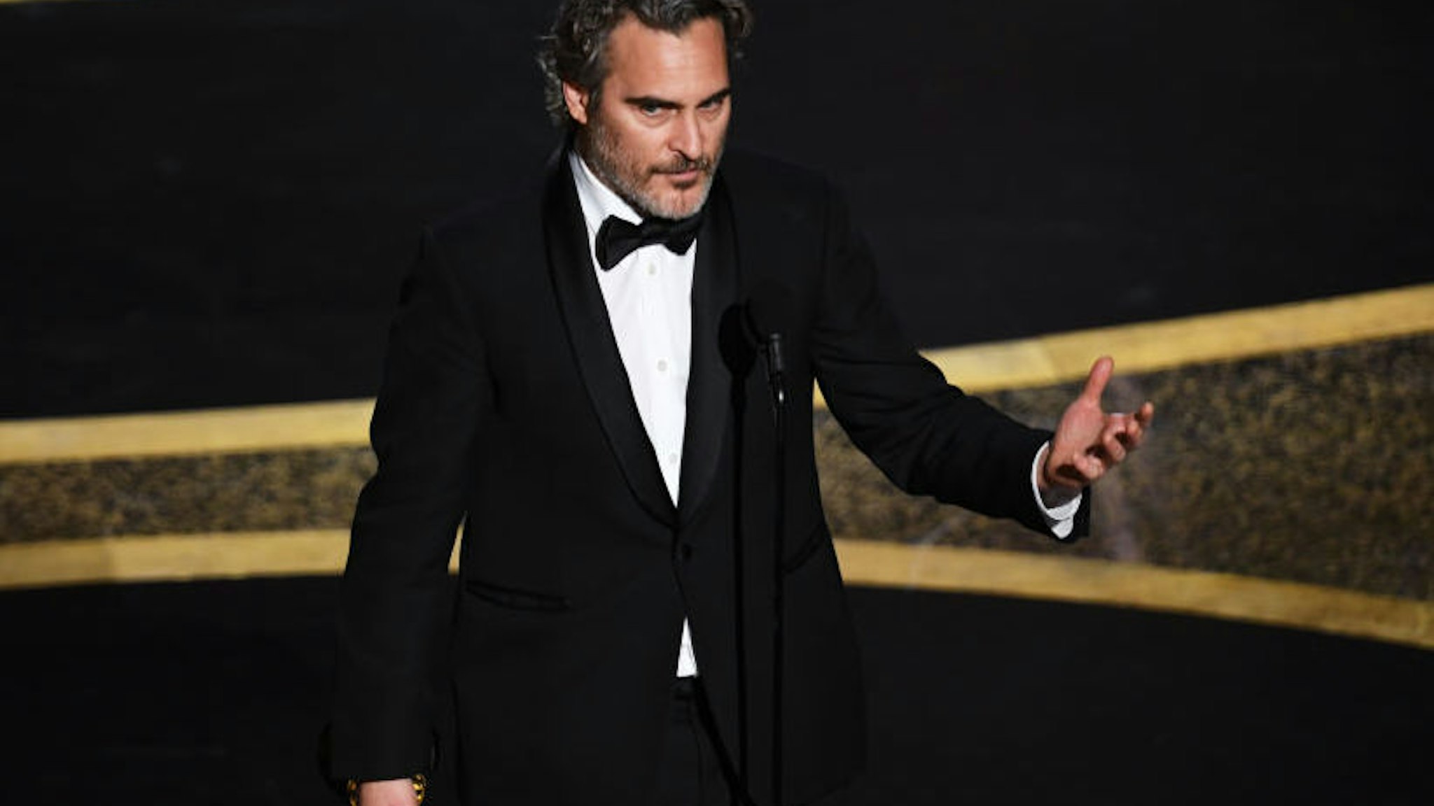 HOLLYWOOD, CALIFORNIA - FEBRUARY 09: Joaquin Phoenix accepts the Actor In A Leading Role award for 'Joker' onstage during the 92nd Annual Academy Awards at Dolby Theatre on February 09, 2020 in Hollywood, California.