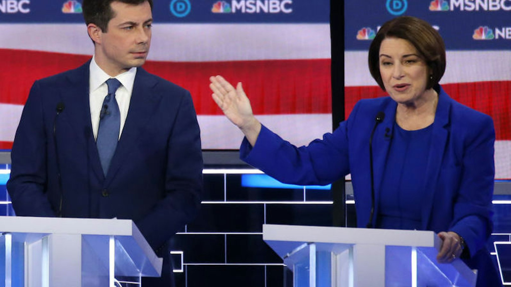 LAS VEGAS, NEVADA - FEBRUARY 19: Democratic presidential candidate former South Bend, Indiana Mayor Pete Buttigieg (L) and Sen. Amy Klobuchar (D-MN) participate in the Democratic presidential primary debate at Paris Las Vegas on February 19, 2020 in Las Vegas, Nevada. Six candidates qualified for the third Democratic presidential primary debate of 2020, which comes just days before the Nevada caucuses on February 22.
