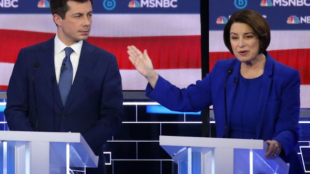 LAS VEGAS, NEVADA - FEBRUARY 19: Democratic presidential candidate former South Bend, Indiana Mayor Pete Buttigieg (L) and Sen. Amy Klobuchar (D-MN) participate in the Democratic presidential primary debate at Paris Las Vegas on February 19, 2020 in Las Vegas, Nevada. Six candidates qualified for the third Democratic presidential primary debate of 2020, which comes just days before the Nevada caucuses on February 22.