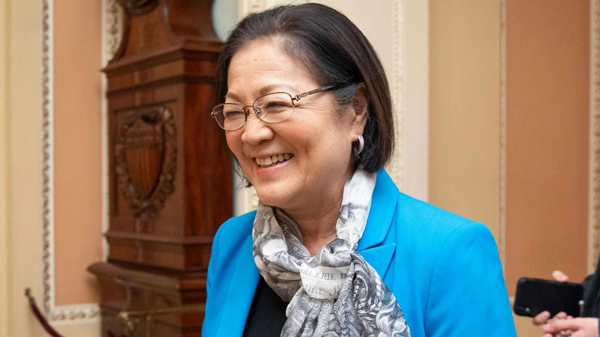 Senator Mazie Hirono, a Democrat from Hawaii, walks with a Senate staff member during a Senate recess at the U.S. Capitol in Washington, D.C., U.S., on Wednesday, Jan. 22, 2020. The Senate set the terms for President Donald Trump's impeachment trial, but not before Majority Leader Mitch McConnell and the president got a reminder that a small group of GOP senators can determine how it will play out.