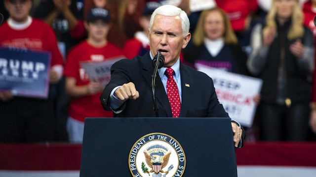 U.S. Vice President Mike Pence speaks during a rally for U.S. President Donald Trump in Des Moines, Iowa, U.S., on Thursday, Jan. 30, 2020. Trump and Democratic presidential hopeful Michael Bloomberg on Thursday unveiled dueling multimillion-dollar campaign ads that are scheduled to air during the Super Bowl on Sunday.