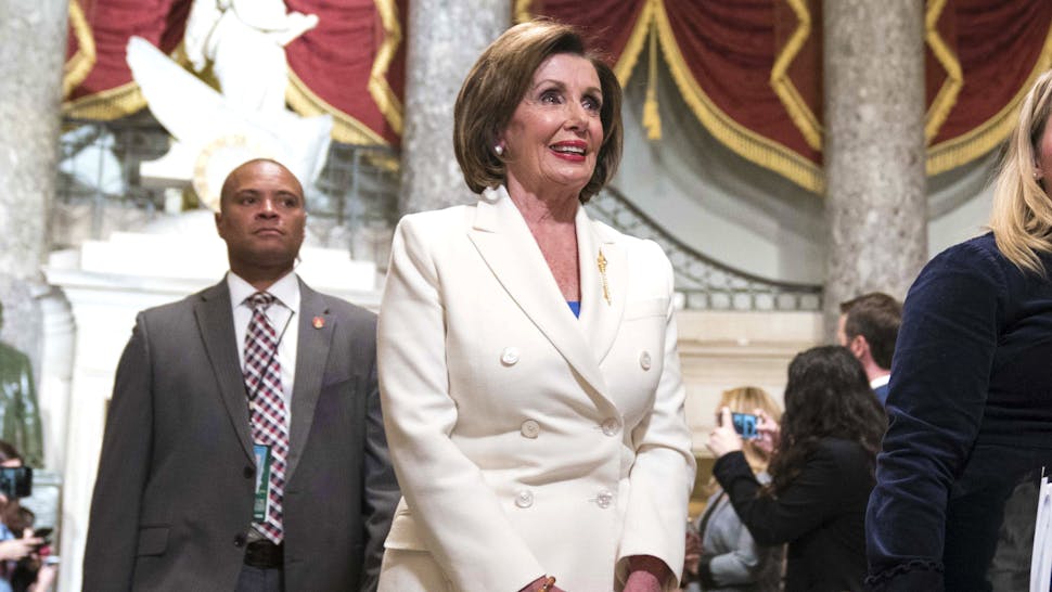 President Trump Gives State Of The Union Address WASHINGTON, DC - FEBRUARY 04: House Speaker Rep. Nancy Pelosi (D-CA) walks through Statuary Hall to the House Chamber for the State of the Union on February 4, 2020 in Washington, DC. President Trump delivers his third State of the Union to the nation the night before the U.S. Senate is set to vote in his impeachment trial.