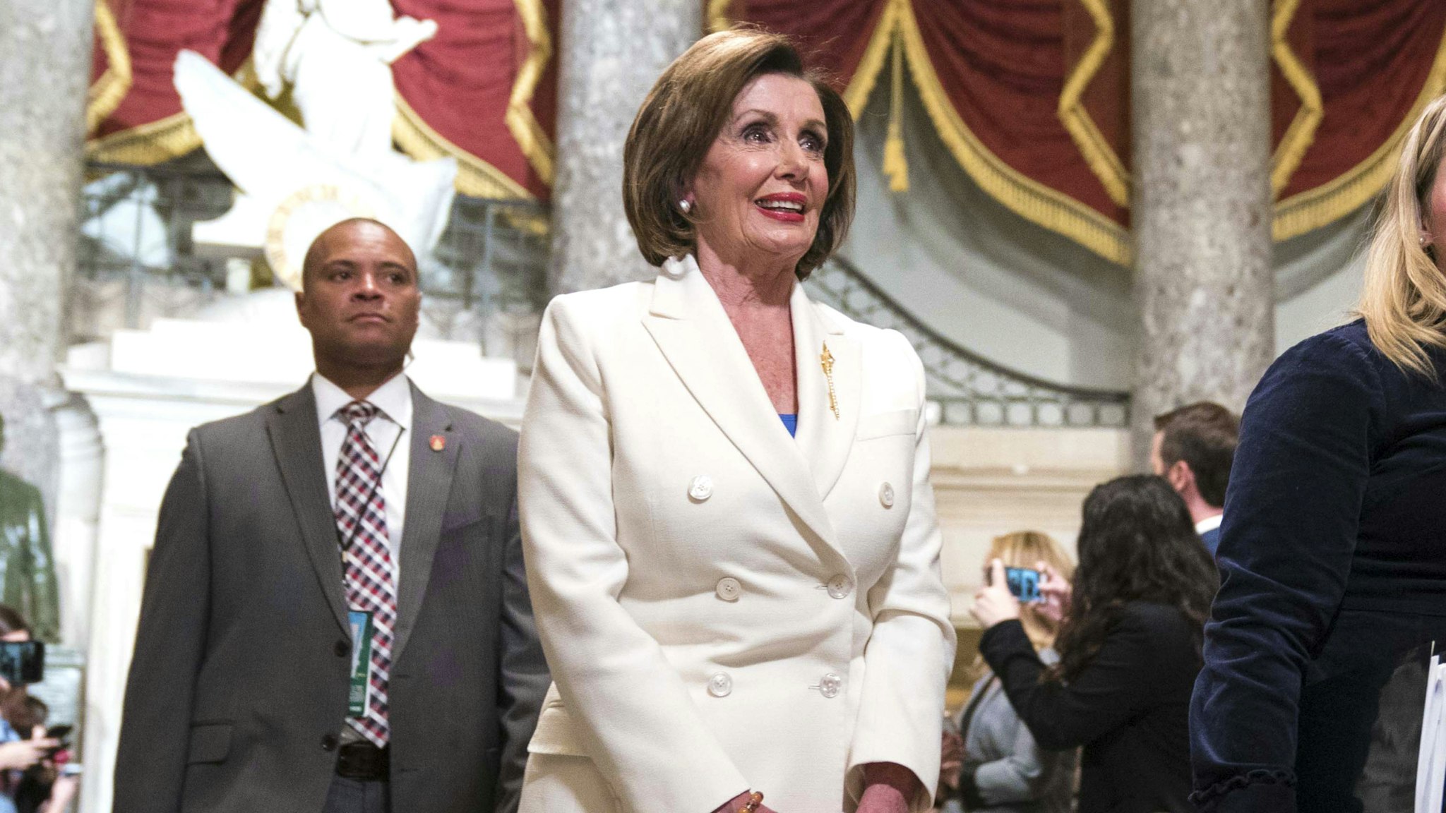 WASHINGTON, DC - FEBRUARY 04: House Speaker Rep. Nancy Pelosi (D-CA) walks through Statuary Hall to the House Chamber for the State of the Union on February 4, 2020 in Washington, DC. President Trump delivers his third State of the Union to the nation the night before the U.S. Senate is set to vote in his impeachment trial.