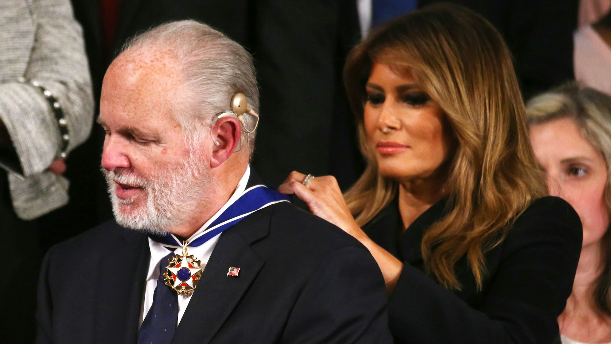 WASHINGTON, DC - FEBRUARY 04: Radio personality Rush Limbaugh reacts as First Lady Melania Trump gives him the Presidential Medal of Freedom during the State of the Union address in the chamber of the U.S. House of Representatives on February 04, 2020 in Washington, DC. President Trump delivers his third State of the Union to the nation the night before the U.S. Senate is set to vote in his impeachment trial.