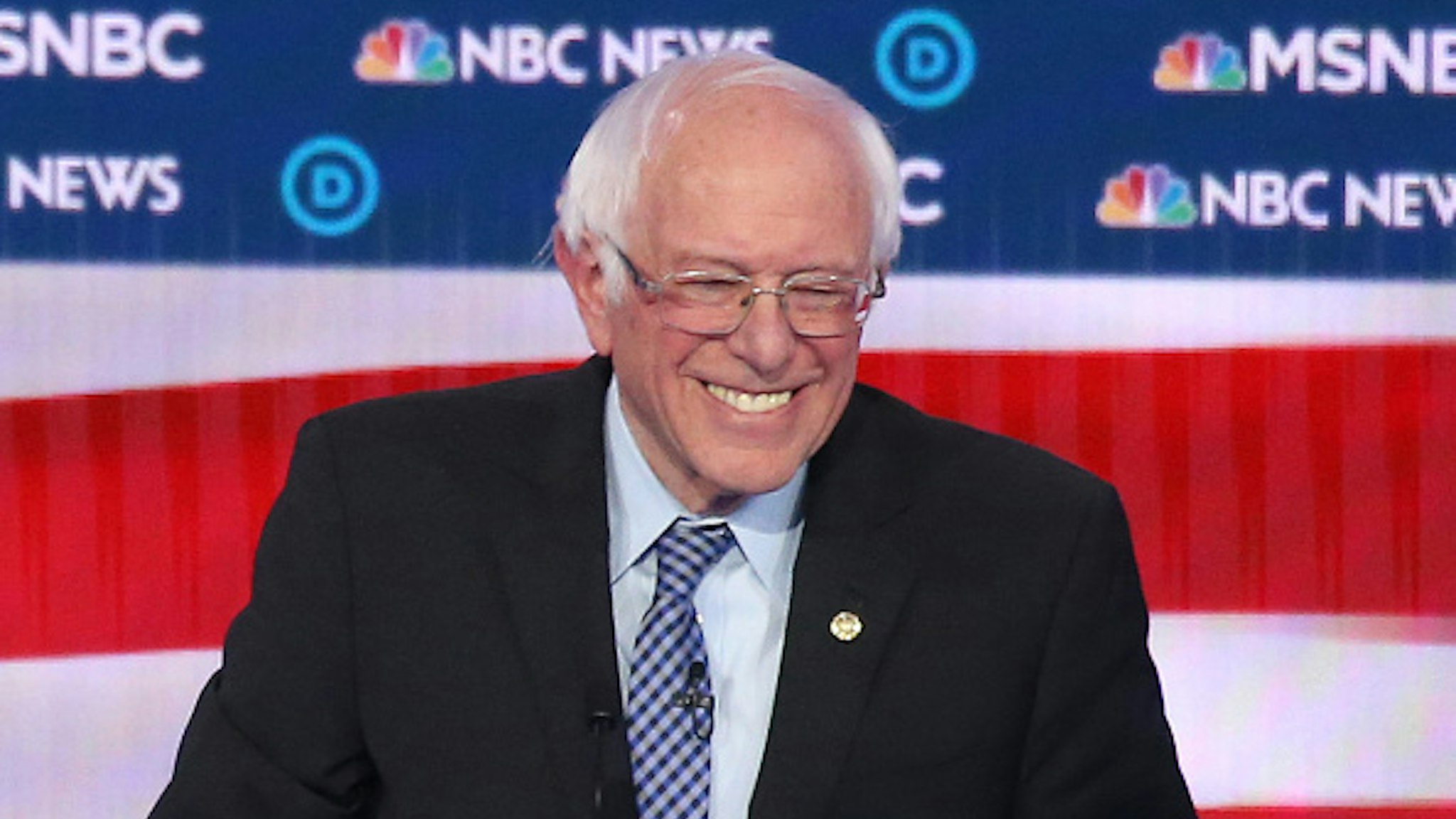 LAS VEGAS, NEVADA - FEBRUARY 19: Democratic presidential candidate Sen. Bernie Sanders (I-VT) smiles during the Democratic presidential primary debate at Paris Las Vegas on February 19, 2020 in Las Vegas, Nevada. Six candidates qualified for the third Democratic presidential primary debate of 2020, which comes just days before the Nevada caucuses on February 22.